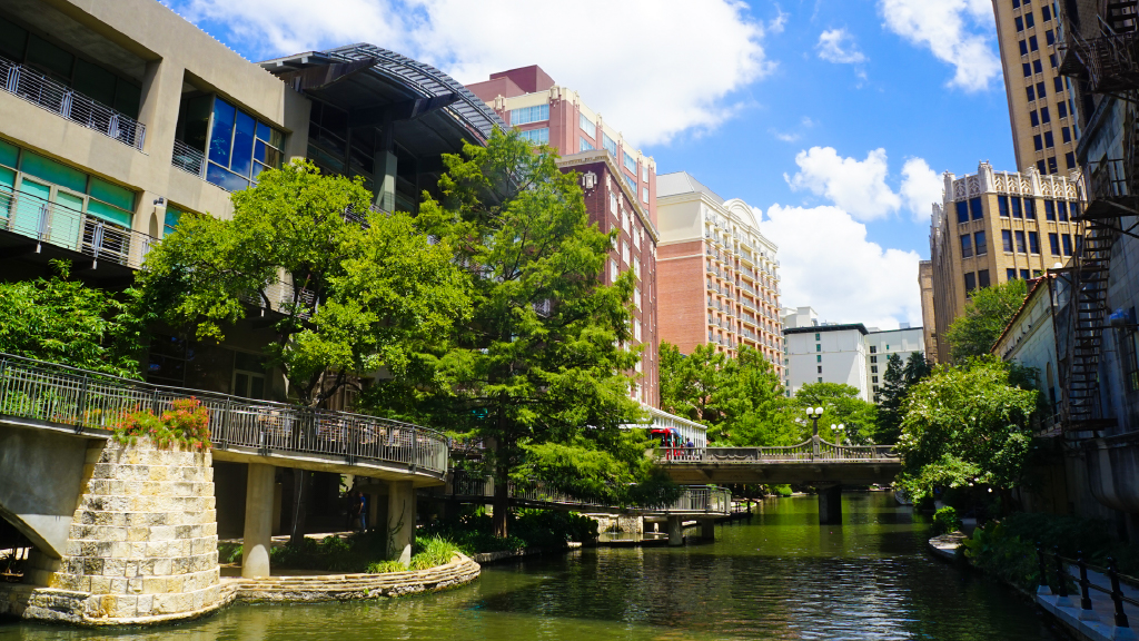 The San Antonio River Walk with its walkways and greenery near Potranco Commons